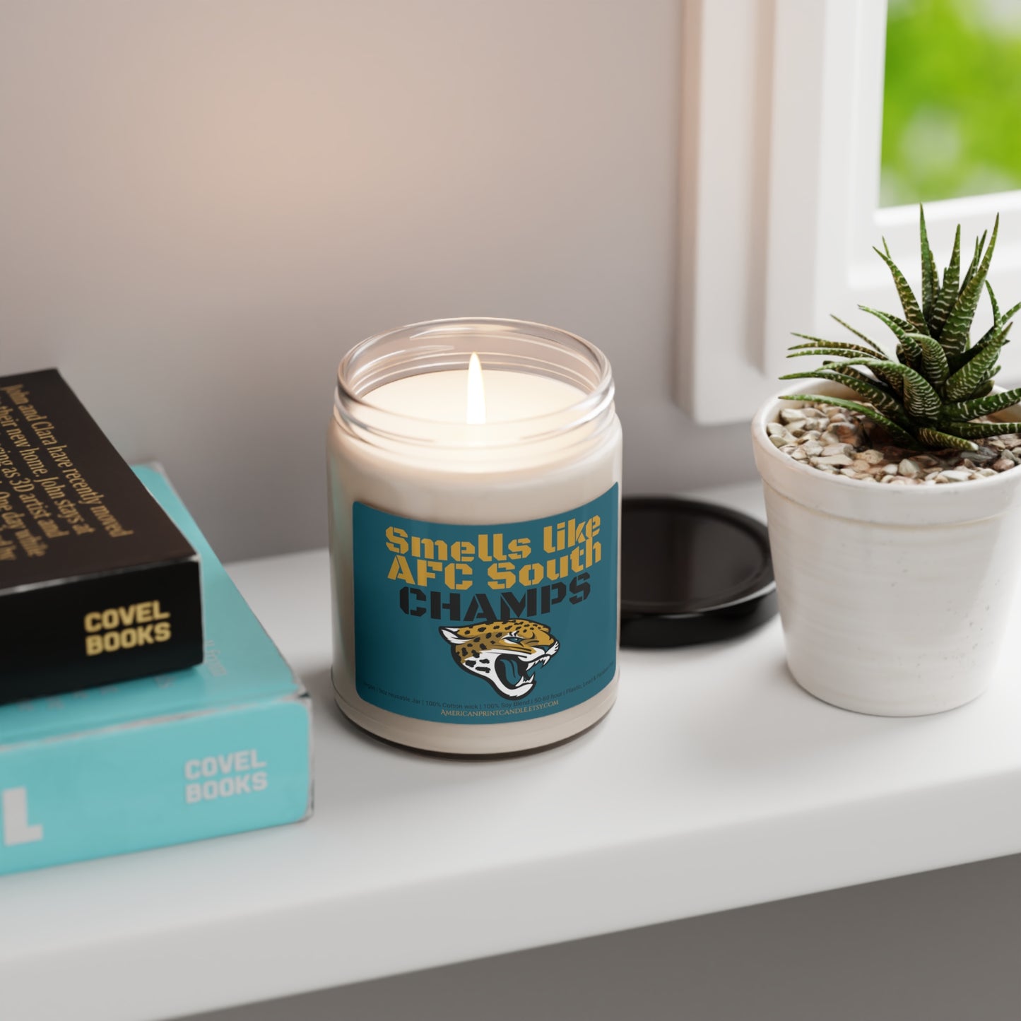 Smells like AFC South CHAMPS Jacksonville Jaguars Scented Soy Candle 9oz